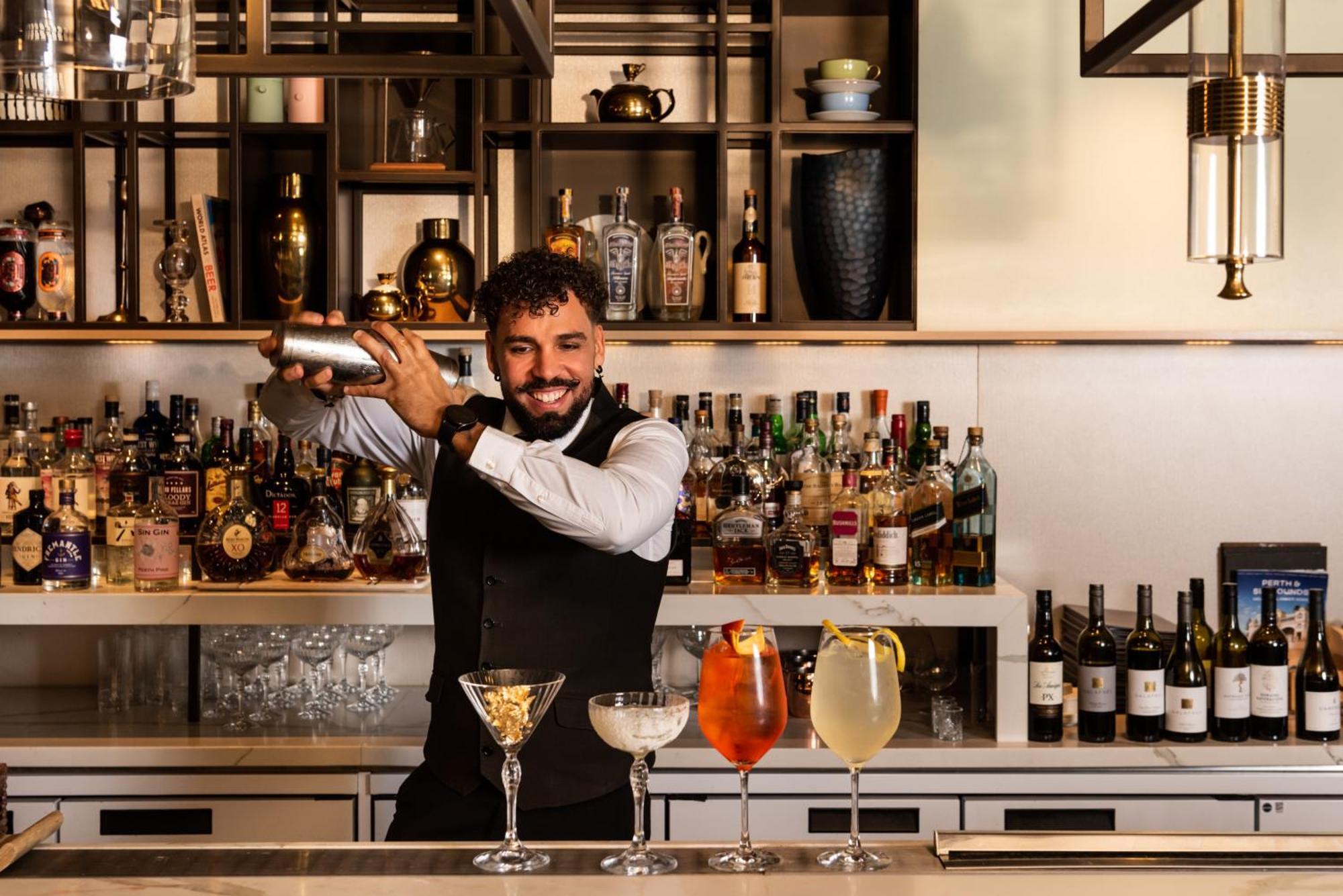 Intercontinental Perth City Centre By Ihg Εξωτερικό φωτογραφία A bartender at work